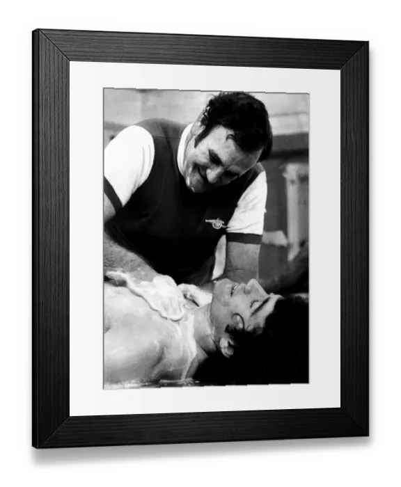 Framed Print : An England footballer is a clean footballer and Don Revie proves it by soaping Kevin