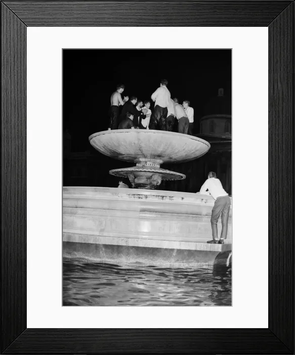 Framed Print : 1966 World Cup Tournament in England. England fans celebrate in the fountains in