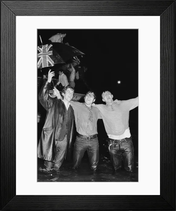Framed Print : 1966 World Cup Tournament in England. England fans celebrate in the fountains in