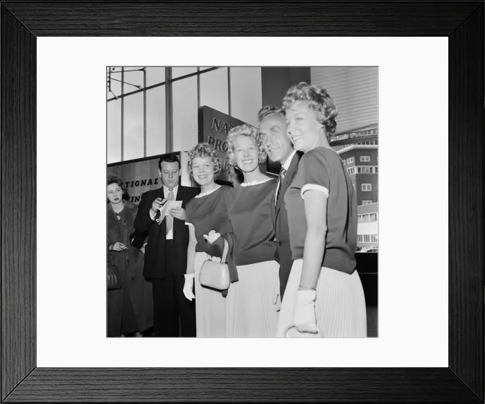 Framed Print : England footballer Billy Wright is greeted by his girlfriend Joy of the Beverley Sisters Framed Print : England footballer Billy Wright is greeted by his girlfriend Joy of the Beverley Sisters