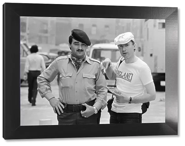 1982 World Cup Finals in Spain. An English fan poses with a Spanish policeman