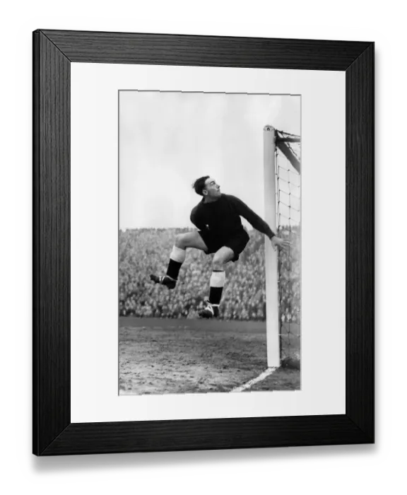 Framed Print : Huddersfield v. Newcastle United: Fairbrother the Newcastle goalkeeper leaps to save Framed Print : Huddersfield v. Newcastle United: Fairbrother the Newcastle goalkeeper leaps to save
