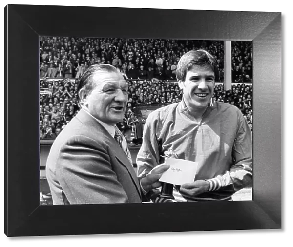 Emlyn Hughes and Bob Paisley before the start of todays game. 17th May 1977