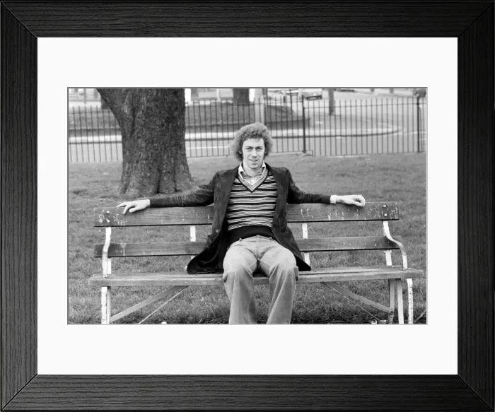 Framed Print : Arsenal footballer Charlie George sitting on a bench at Hackney marshes February