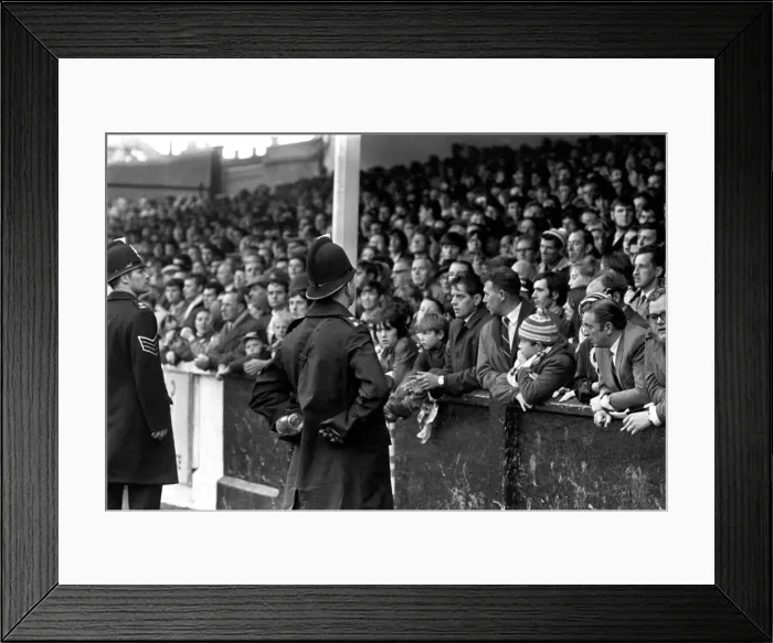 Framed Print : Sport: Football: Leeds v. Derby. The Referee talks to police after the bottle incident Framed Print : Sport: Football: Leeds v. Derby. The Referee talks to police after the bottle incident