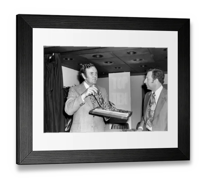 Framed Print : Football manager Don Revie accepts his prize at the Tie Manufacturers Association Top Ten Framed Print : Football manager Don Revie accepts his prize at the Tie Manufacturers Association Top Ten