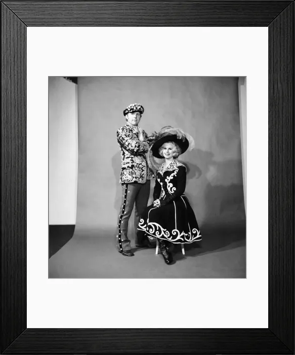 Framed Print : Bobby Moore West Ham & England footballer pictured with wife in fancy dress as Pearly