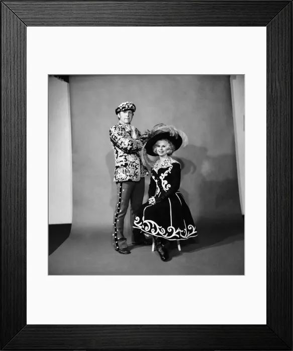 Framed Print : Bobby Moore West Ham & England footballer pictured with wife in fancy dress as Pearly