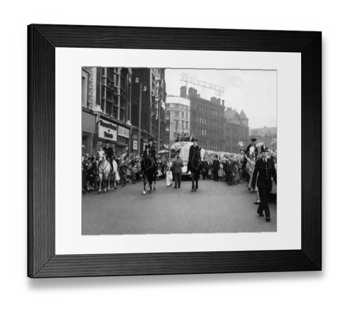 Framed Print : Led by mascot Jack Irons, resplendant in a red and white suit