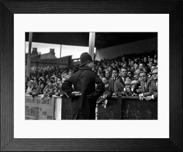 Framed Print : Sport: Football: Leeds v. Derby. The Referee talks to police after the bottle incident