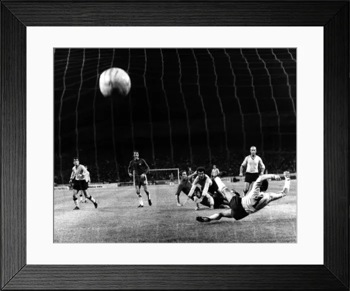 Framed Print : Chelsea v Aris Slaonika. Cup Winners Cup. Marvin Hinton of Chelsea scores before Framed Print : Chelsea v Aris Slaonika. Cup Winners Cup. Marvin Hinton of Chelsea scores before