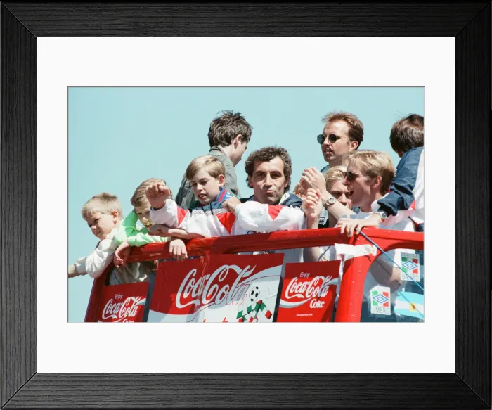 Framed Print : The England football team arrive at Luton airport after returning from the World Cup