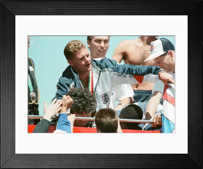 Framed Print : The England football team arrive at Luton airport after returning from the World Cup