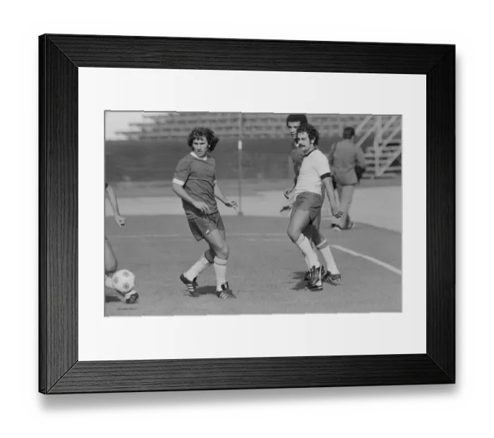 Framed Print : Brazilian football star Zico in a training session with teammate Rivelino ahead of their