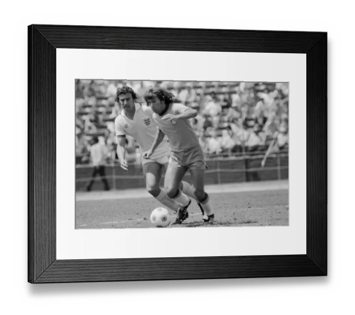 Framed Print : Brazilian football star Zico in action against Terry Butcher of England during the two Framed Print : Brazilian football star Zico in action against Terry Butcher of England during the two