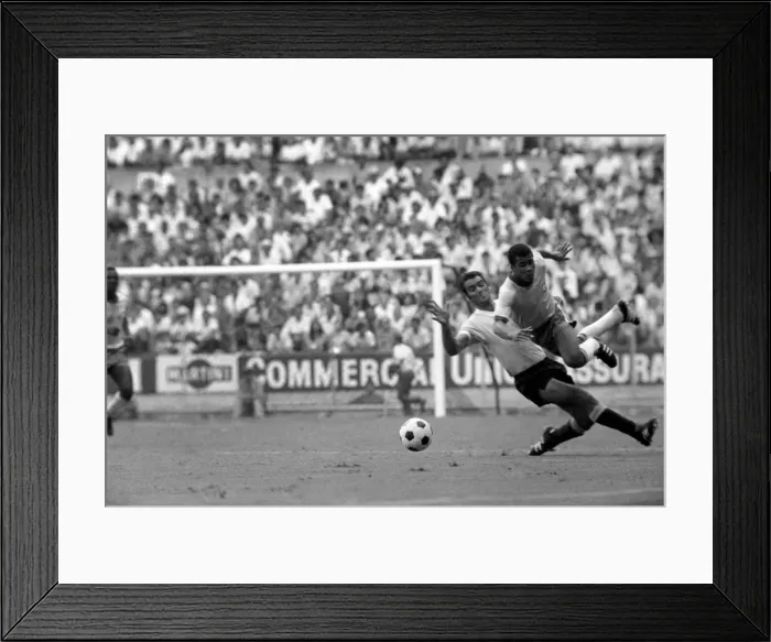 Framed Print : Brazil v. Uruguay: World Cup Semi-Final. Jairzinho of Brazil (right Framed Print : Brazil v. Uruguay: World Cup Semi-Final. Jairzinho of Brazil (right