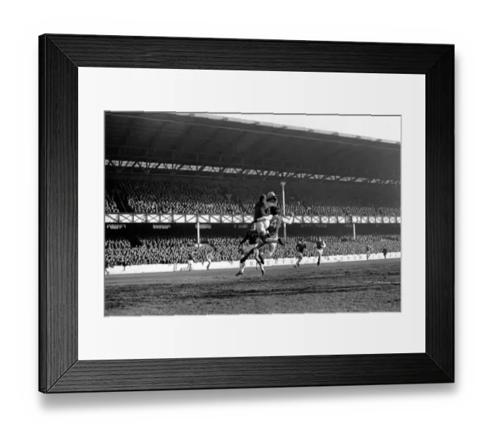 Framed Print : Everton v. Arsenal: West punches away corner kick from McLintockIs head with Hurst Framed Print : Everton v. Arsenal: West punches away corner kick from McLintockIs head with Hurst