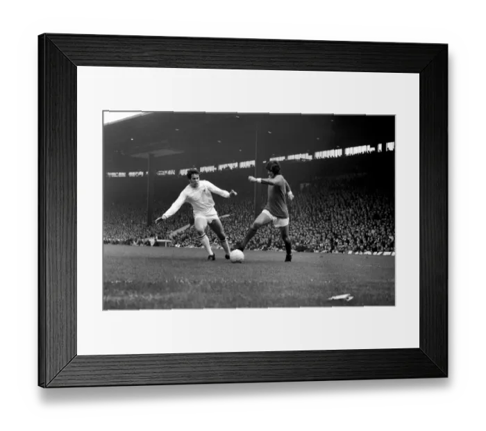 Framed Print : Sport: Football: Manchester United v. Nottingham Forest. George Best Dribbles