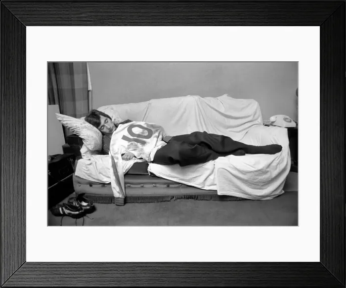 Framed Print : England and Stoke international hero Alan Hudson. Alan Hudson asleep with his England