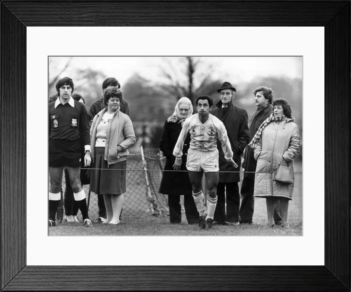 Framed Print : The local fans don t get too excited, even though it Framed Print : The local fans don t get too excited, even though it
