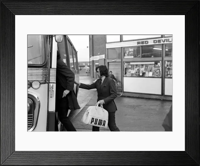 Framed Print : George Best right as he left Old Trafford ground to board the coach on route to Ipswich Framed Print : George Best right as he left Old Trafford ground to board the coach on route to Ipswich