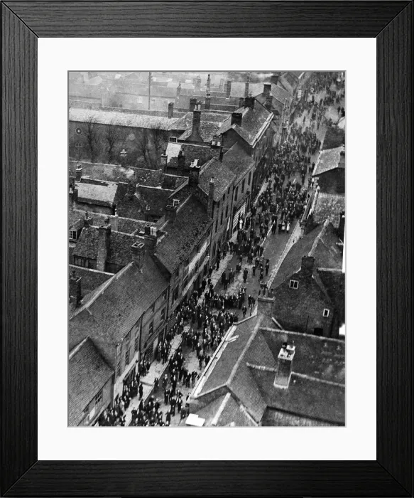 Framed Print : Aerial view of the annual Shrove Tuesday football game which takes place along the high Framed Print : Aerial view of the annual Shrove Tuesday football game which takes place along the high