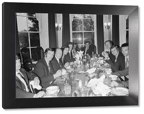 Don Revie heads the table as the Leeds United team have a celebratorial meal at their