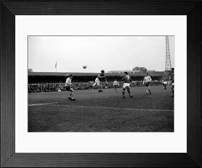 Framed Print : Mick Hill heads goalwards but is outside the upright. December 1969 Z12046-002