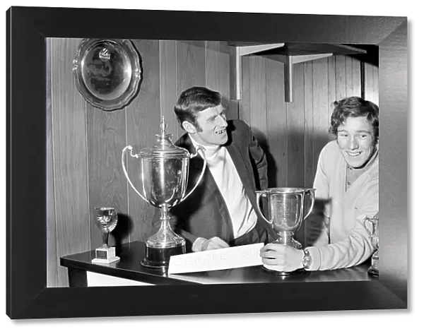 Making room for another trophy, Ian Bowyer and skipper Tony Book show where the League