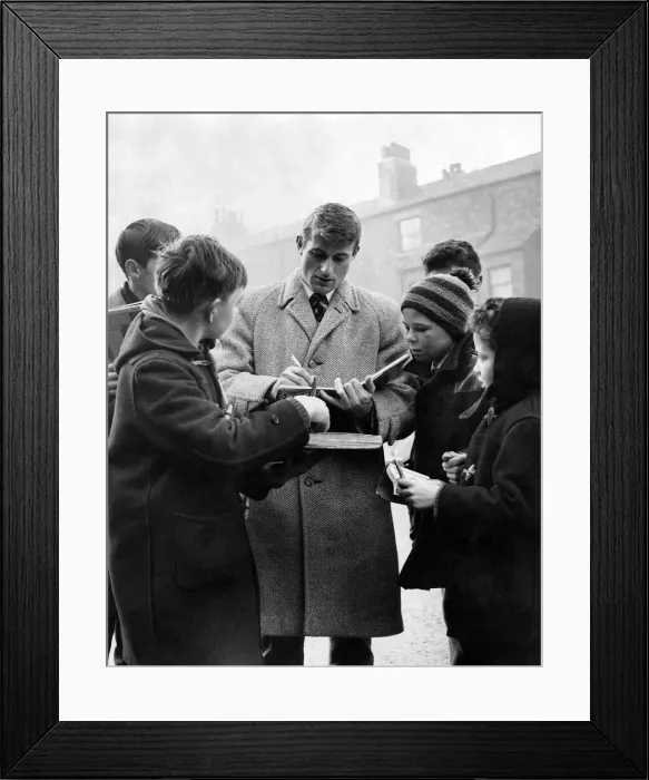 Framed Print : Roger Hunt was besieged by autograph hunters at Anfield Framed Print : Roger Hunt was besieged by autograph hunters at Anfield