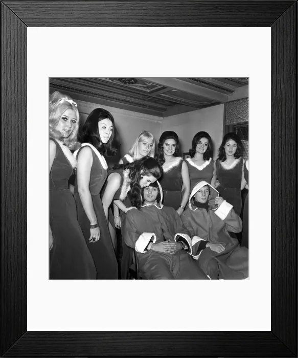 Framed Print : George Best and his ex girlfriend Eva Haralsted met but did not speak at a get together Framed Print : George Best and his ex girlfriend Eva Haralsted met but did not speak at a get together