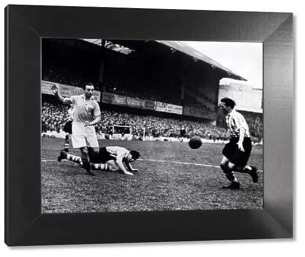 Blackpool v Southampton Stanley Matthews (left) with Peter Sillett (on ground)