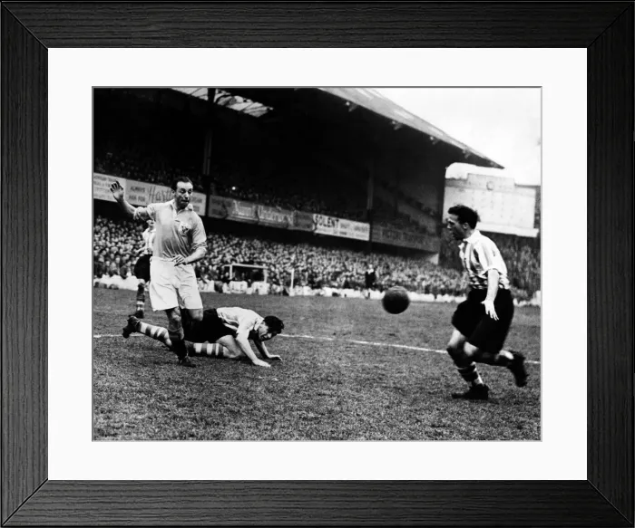 Framed Print : Blackpool v Southampton Stanley Matthews (left) with Peter Sillett (on ground) Framed Print : Blackpool v Southampton Stanley Matthews (left) with Peter Sillett (on ground)