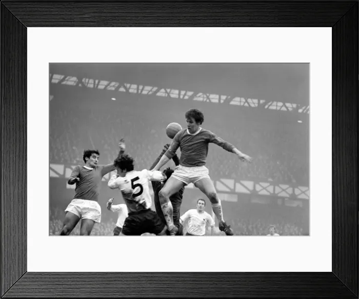 Framed Print : English League Division One match. Everton v. Derby. Joe Royle leaps above Derby keeper Framed Print : English League Division One match. Everton v. Derby. Joe Royle leaps above Derby keeper