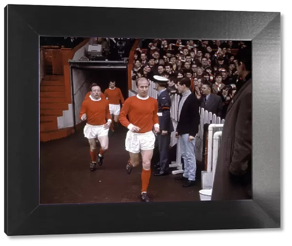 Bobby Charlton leads Manchester United team mates including Nobby Stiles