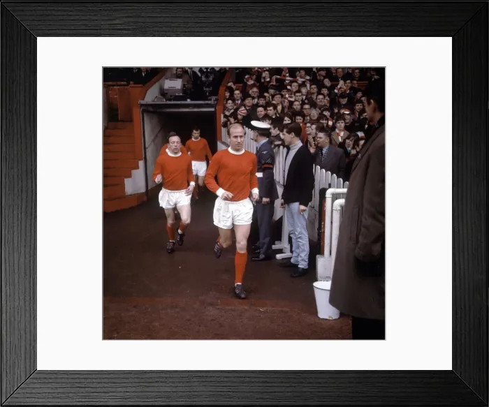 Framed Print : Bobby Charlton leads Manchester United team mates including Nobby Stiles Framed Print : Bobby Charlton leads Manchester United team mates including Nobby Stiles