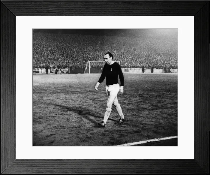 Framed Print : Spurs Scotish international, Alan Gilzean, leaves the pitch after being given his Framed Print : Spurs Scotish international, Alan Gilzean, leaves the pitch after being given his