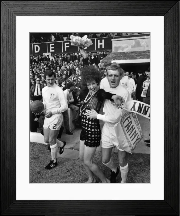 Framed Print : Millwalls Eamonn Dunphy (with inside forward) hugs Melina Martin as the Millwall Framed Print : Millwalls Eamonn Dunphy (with inside forward) hugs Melina Martin as the Millwall