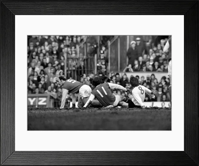 Framed Print : Football: Arsenal F. C. (2) vs. Liverpool F. C. (0). Brady of Arsenal tackles Hughes of Framed Print : Football: Arsenal F. C. (2) vs. Liverpool F. C. (0). Brady of Arsenal tackles Hughes of