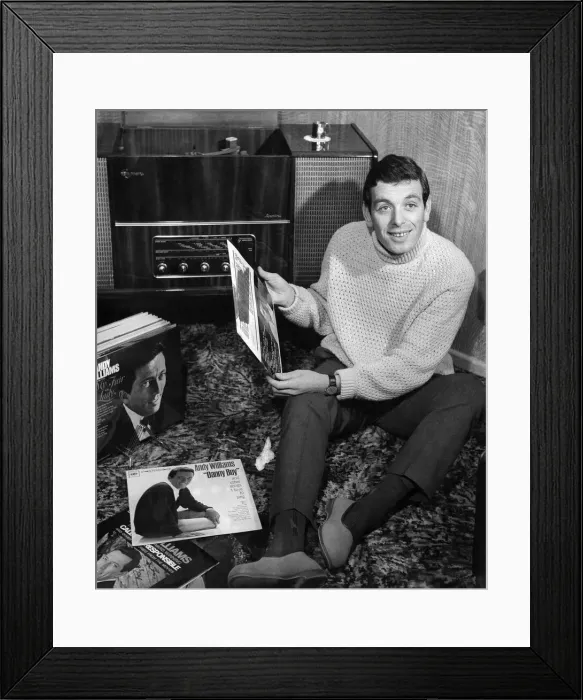 Framed Print : Ian Callaghan, Liverpool F. C.s right winger relaxes with his record collection Framed Print : Ian Callaghan, Liverpool F. C.s right winger relaxes with his record collection