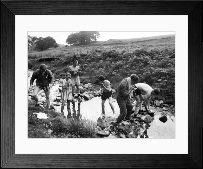 Framed Print : Watford in training in the Lake District. Some of the team bathing in a stream near Framed Print : Watford in training in the Lake District. Some of the team bathing in a stream near