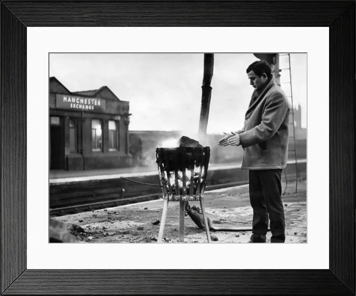 Framed Print : Keeping warm on a frosty morning is a problem, but Huddersfield Town Framed Print : Keeping warm on a frosty morning is a problem, but Huddersfield Town
