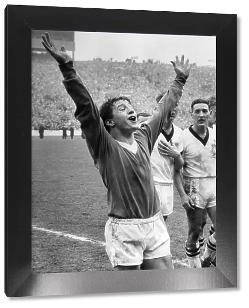Willie Henderson of Rangers celebrates on the pitch at the end of