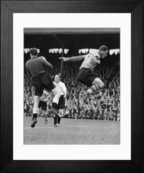 Framed Print : Fulhum v. Leeds United. John Charles the Leeds United Framed Print : Fulhum v. Leeds United. John Charles the Leeds United