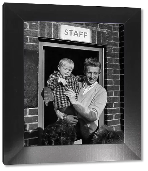 Manchester Uniteds Denis Law, pictured as he leaves Old Trafford with his son Andrew