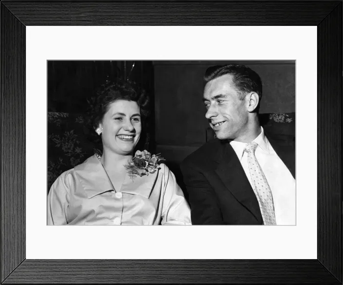 Framed Print : Manchester United goalkeeper Ray Wood with his wife at a London hotel. May 1957 P009693 Framed Print : Manchester United goalkeeper Ray Wood with his wife at a London hotel. May 1957 P009693