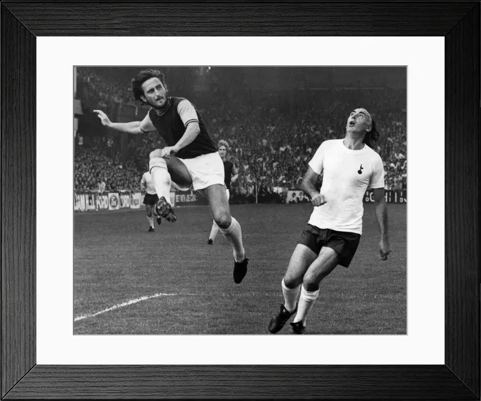 Framed Print : W. Ham v Spurs. Lampard puts over a centre leaving Gilzean gasping Framed Print : W. Ham v Spurs. Lampard puts over a centre leaving Gilzean gasping
