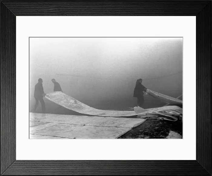 Framed Print : Cover onto the Manchester City pitch after the match had been declared off because of Framed Print : Cover onto the Manchester City pitch after the match had been declared off because of