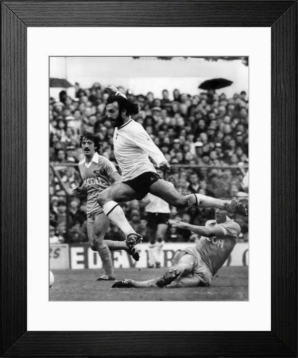 Framed Print : Ricky Villa bursts through a stoke tackle before getting the injury that will keep him Framed Print : Ricky Villa bursts through a stoke tackle before getting the injury that will keep him