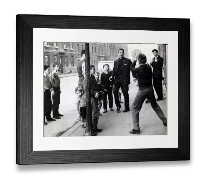 Framed Print : Pat Crerand 1960 with Charlie Gallagher And Kids playing football in street
